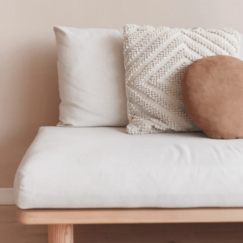 white square pillow on white sofa 2026 03 19 04 27 13 utc